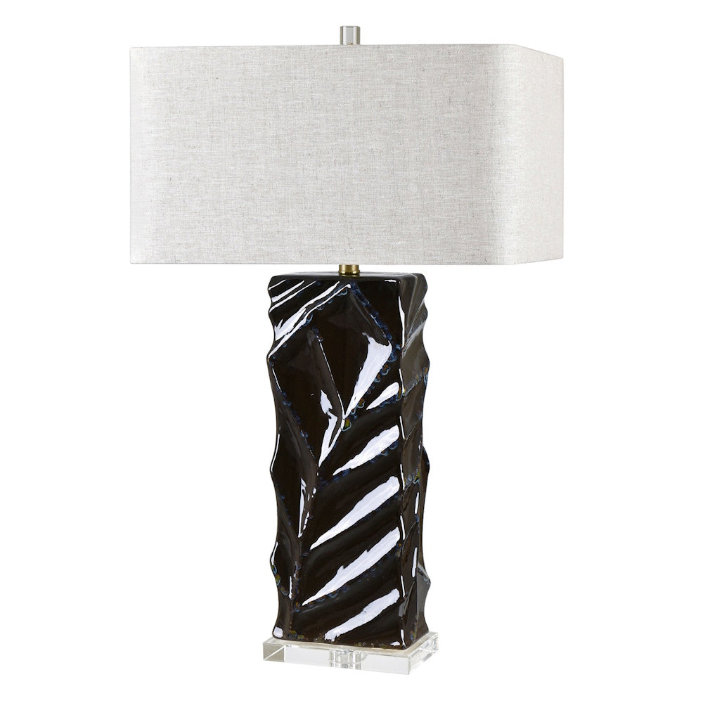 Modern table lamp with a textured black ceramic base and a white rectangular fabric lampshade on a clear acrylic stand.