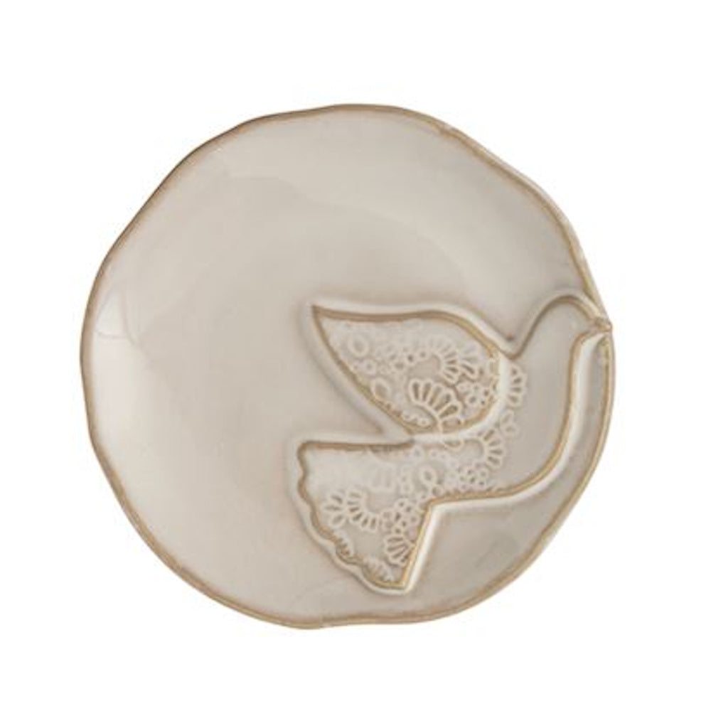 Small white ceramic tidbit plate with an embossed lace-patterned dove motif in the center.