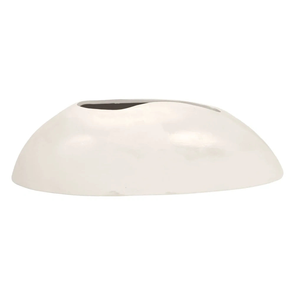 A glossy, low-profile white ceramic vase with an organic, asymmetrical oval shape and a narrow top opening.