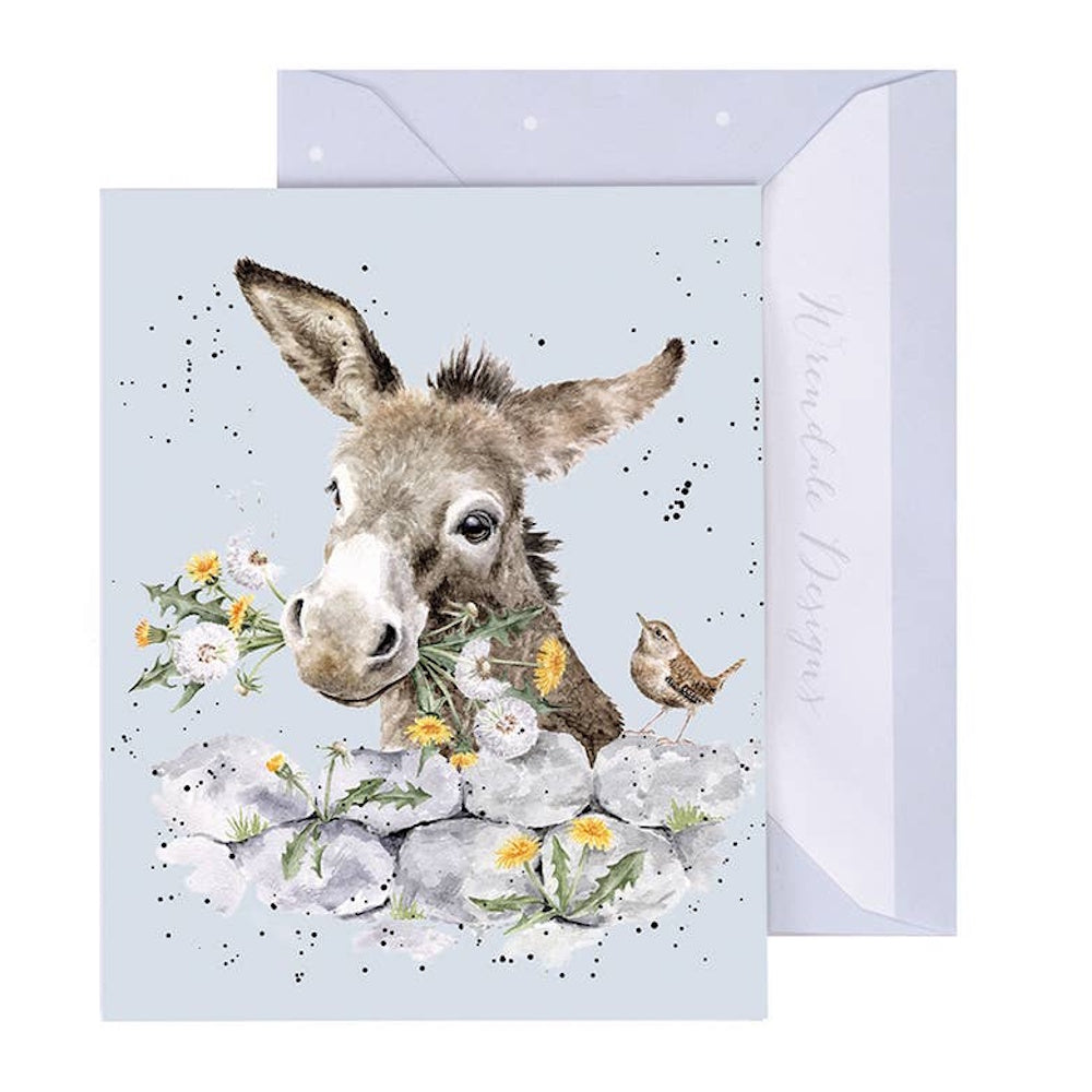 Watercolor donkey holding dandelions in its mouth with a small bird on a stone wall, by Wrendale Designs.