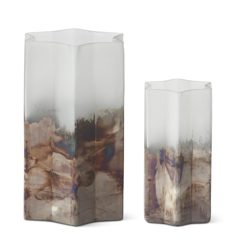Two star-shaped glass vases with frosted white tops and metallic acid-wash bases.