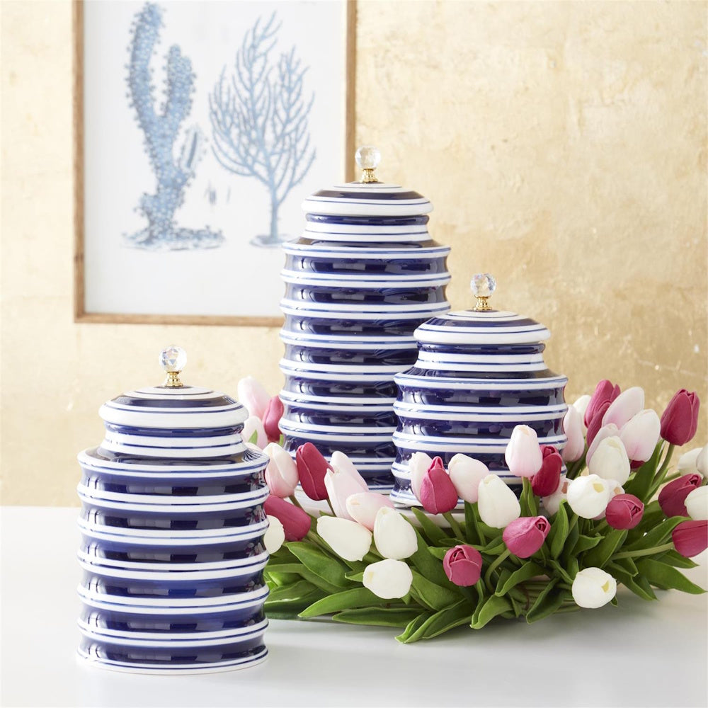 Blue and white striped ceramic ginger jars with crystal lids, surrounded by a fuchsia pink and white tulip wreath.