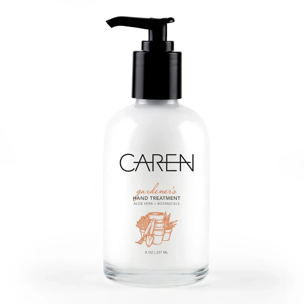 A clear bottle of Caren Gardener's Hand Treatment with a black pump, featuring botanical illustrations.