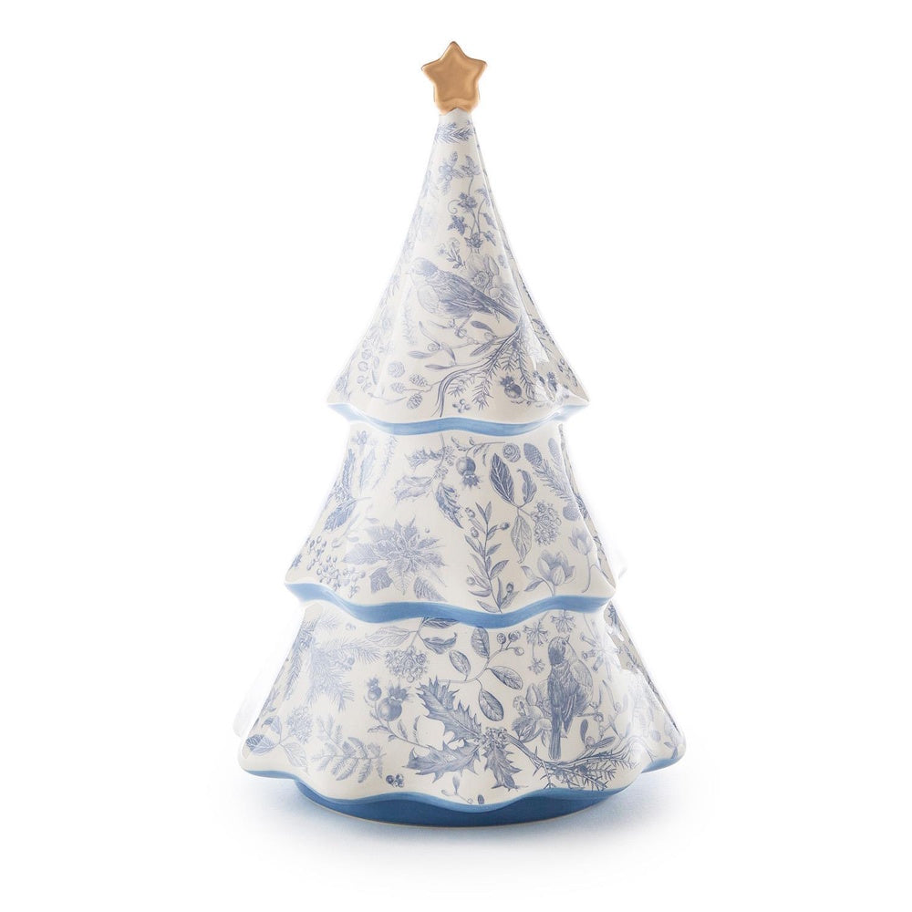 White ceramic Christmas tree with a blue toile flora and fauna pattern, topped with a small gold star.