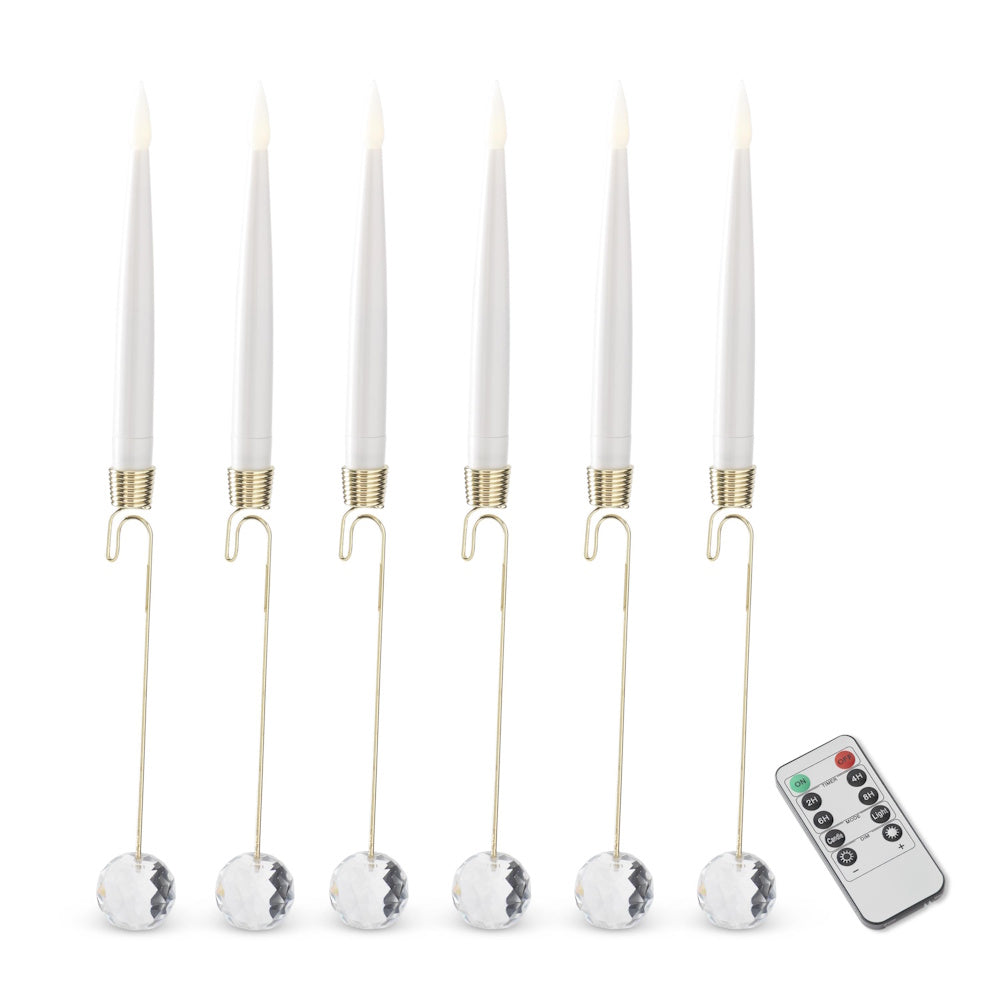 Set of six white LED taper candles with crystal pendant counterweights and a remote control.