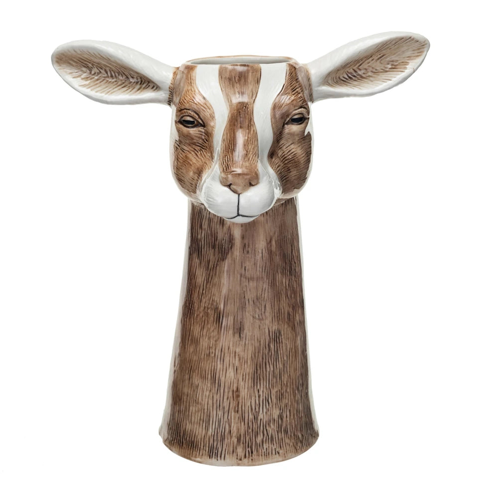 Hand-painted stoneware goat head vase with large ears and a white and brown glazed finish.