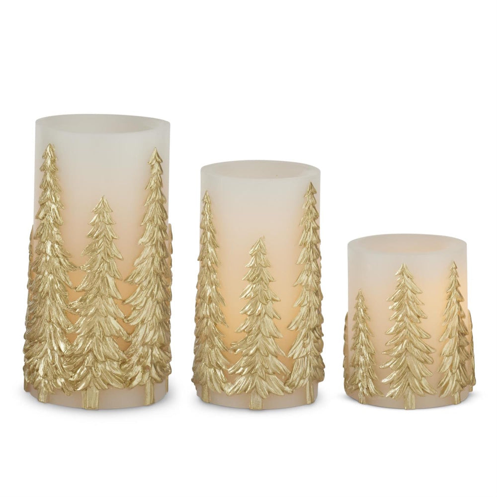 A set of three LED pillar candles featuring embossed gold tree patterns.