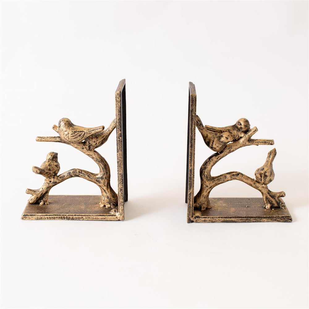 Antique gold finish bird bookends featuring decorative birds perched on branches. Ideal for nature-themed home office decor.