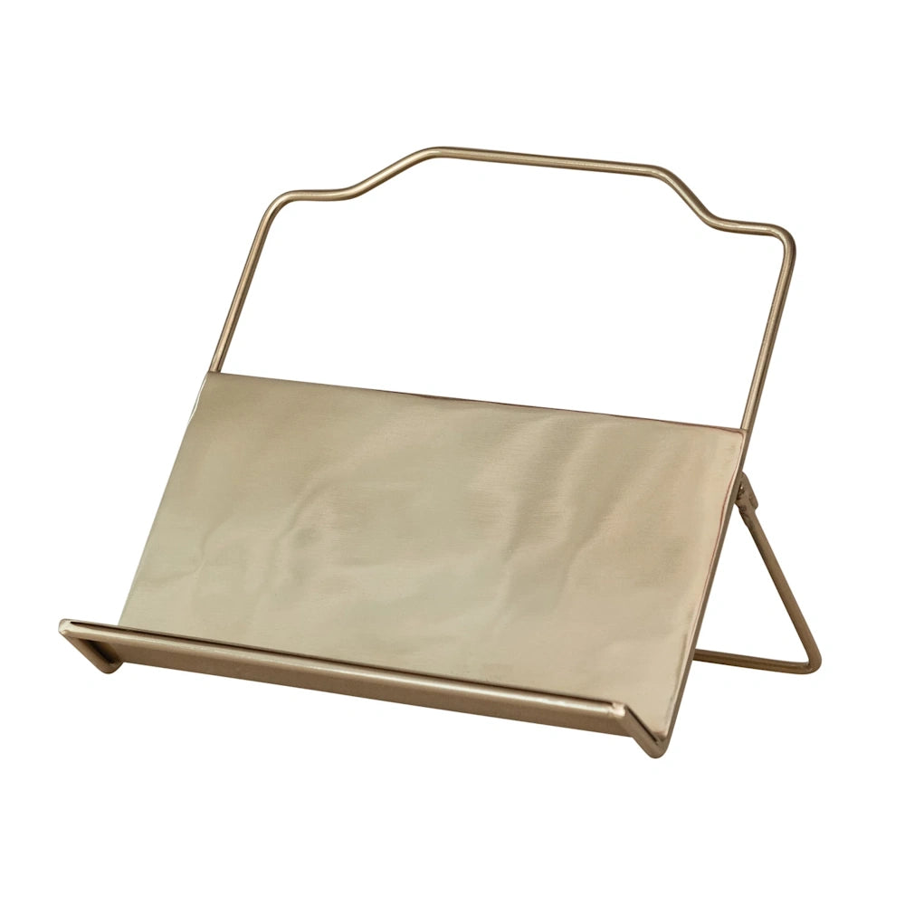 Gold metal easel stand for books or tablets with sleek minimalist wire design and folding support.