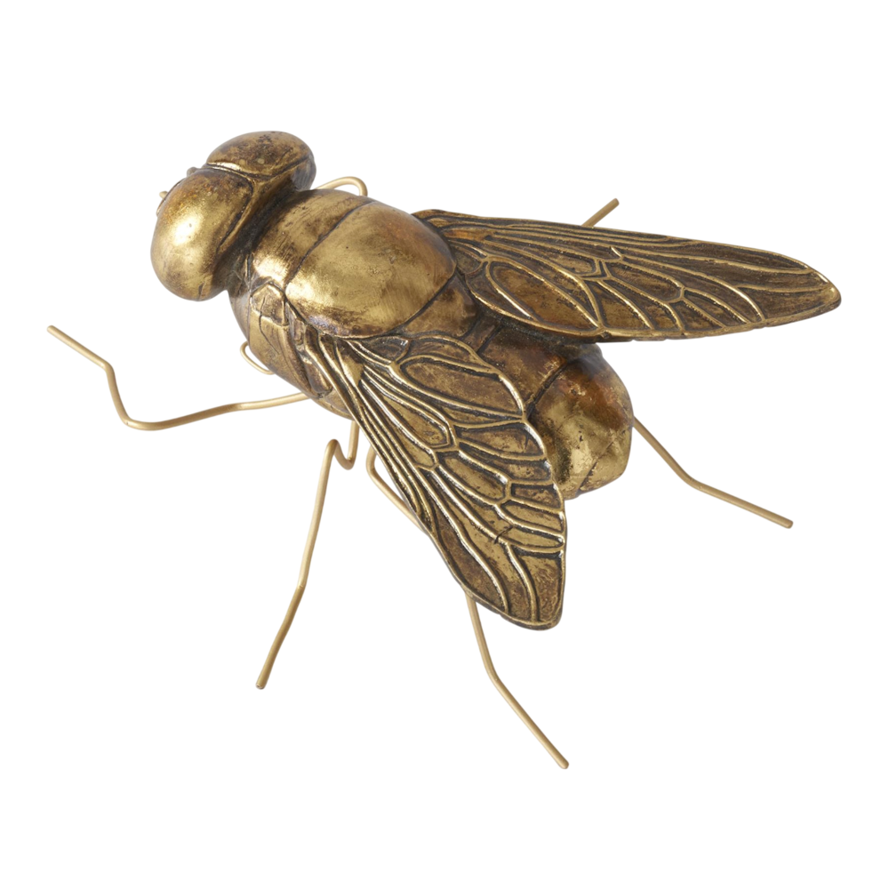 Gold resin housefly figurine with wire legs and detailed wings on a white background.