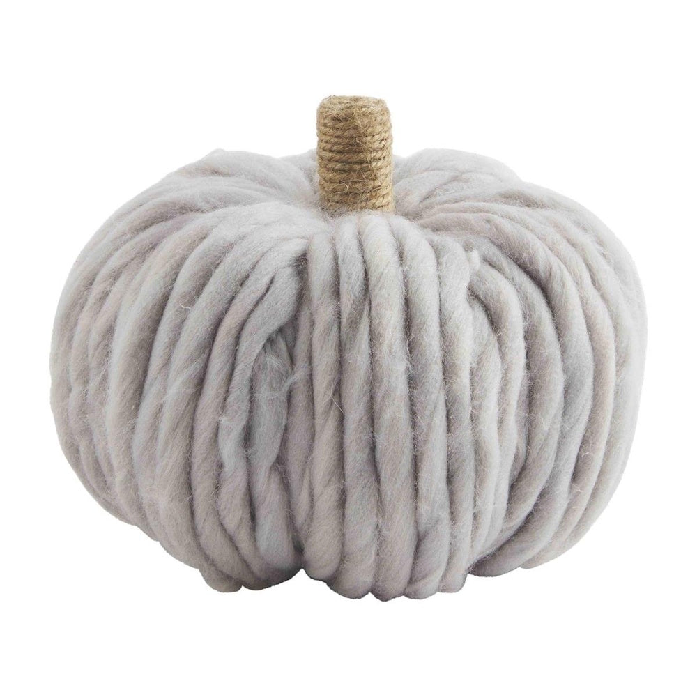 Soft grey chunky knit yarn pumpkin decor with a twine-wrapped jute stem.