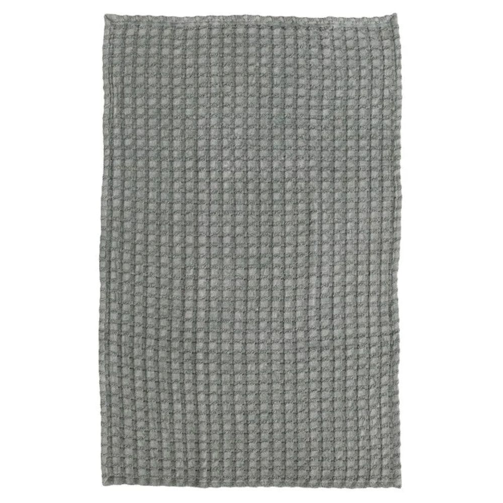 Gray stonewashed cotton waffle weave tea towel showing an oversized rectangular design and textured surface.