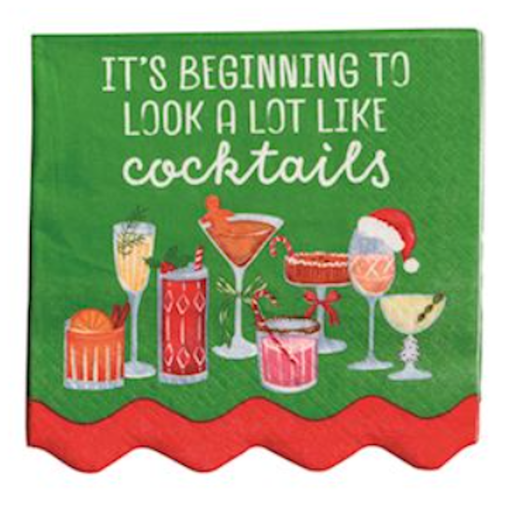 Green napkin saying "It's beginning to look a lot like cocktails" with holiday drinks below.