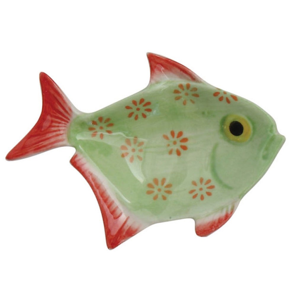 A green, fish-shaped ceramic dish featuring small orange painted flowers and red accents on its fins and tail.