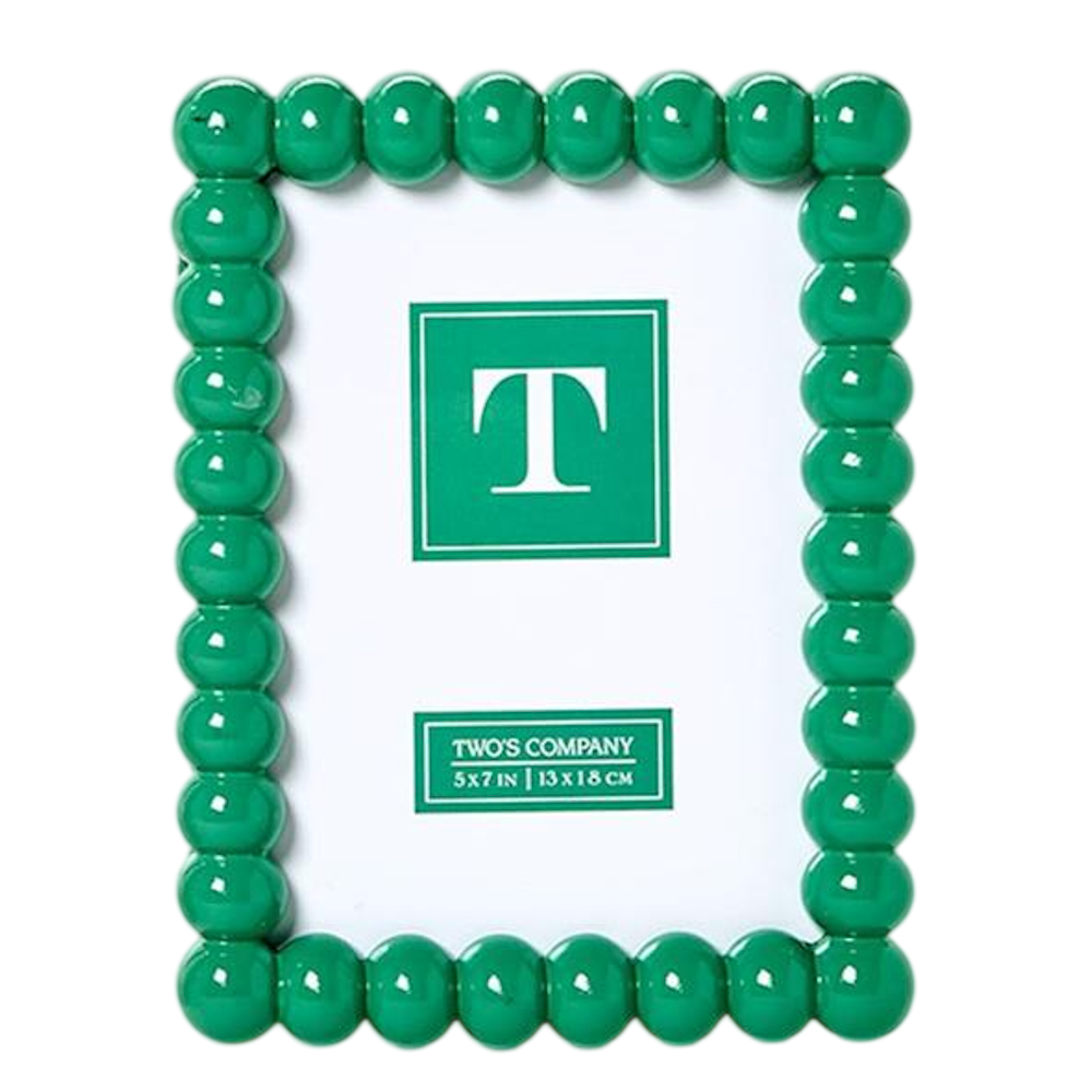 A glossy green photo frame with a beaded hobnail border.