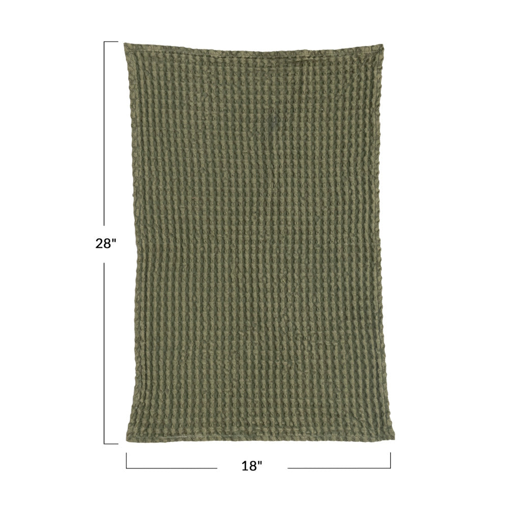 An olive green waffle-weave cotton tea towel showing dimensions of 28 inches long by 18 inches wide.