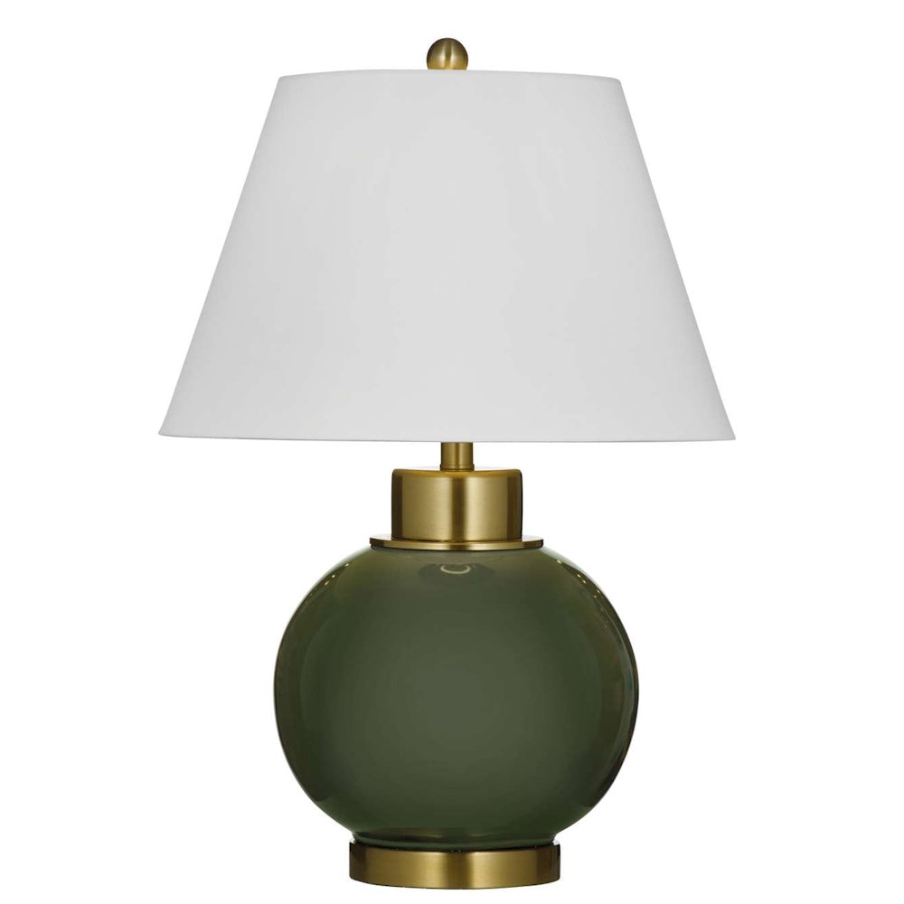 Table lamp featuring a spherical olive green glass base, brushed brass accents, and a white tapered shade.