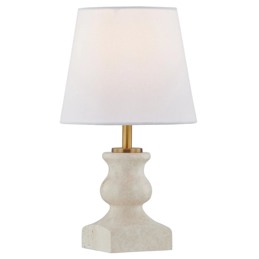 Modern stone table lamp with white fabric shade and gold brass neck on a white background.