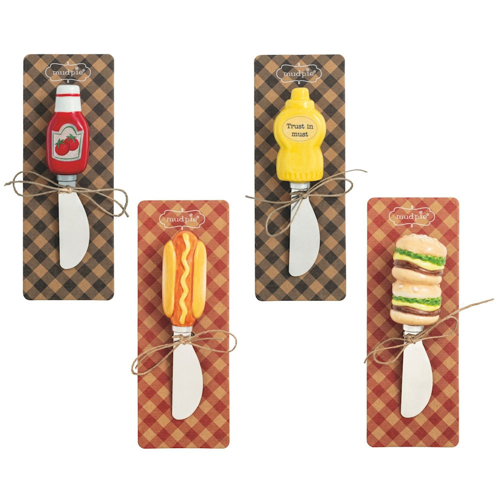 Mud Pie grill-themed spreaders with ketchup, mustard, hot dog, and hamburger handles on checkered gift cards.