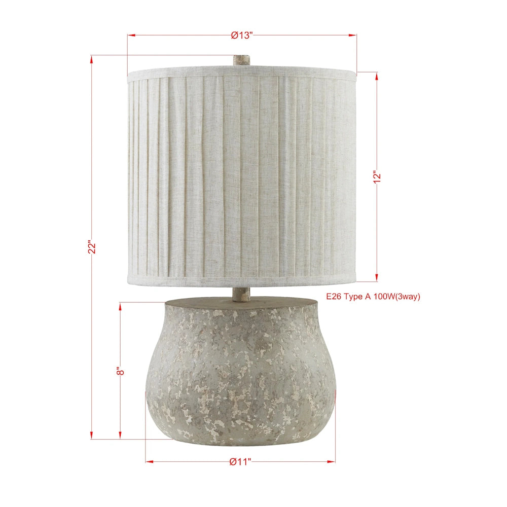 Rustic stone table lamp with pleated linen shade. Dimensions: 22" height, 13" shade diameter, E26 100W bulb compatible.
