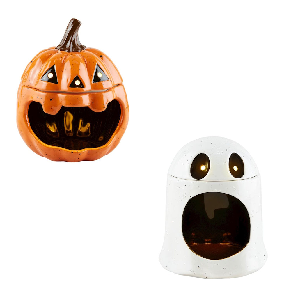 Pumpkin and ghost ceramic open mouth Halloween candy bowls with glowing eyes.