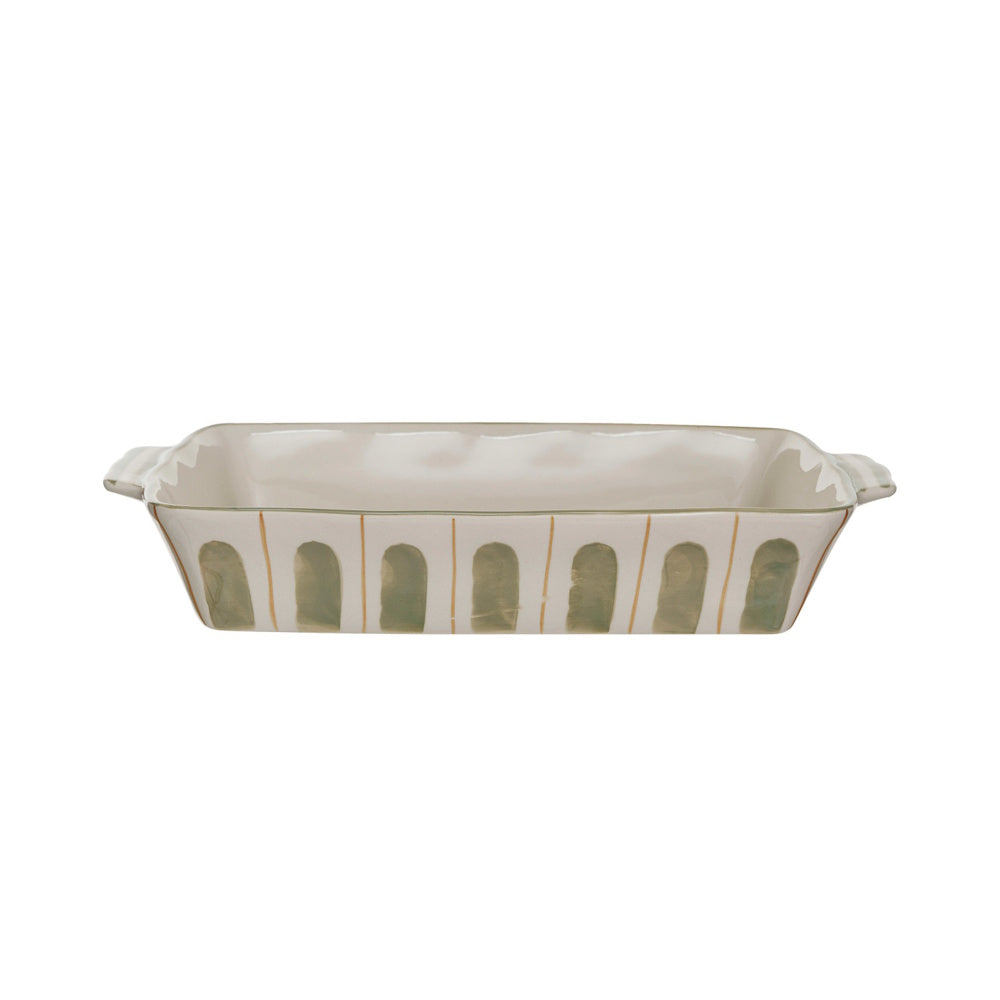 A rectangular stoneware baking dish with green arches and thin orange lines on a white background.