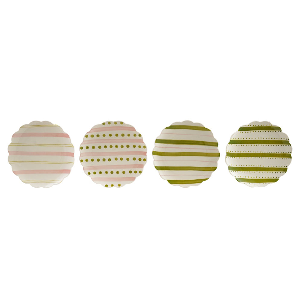 Set of four hand-painted scalloped ceramic plates with green and pink striped and dotted patterns.