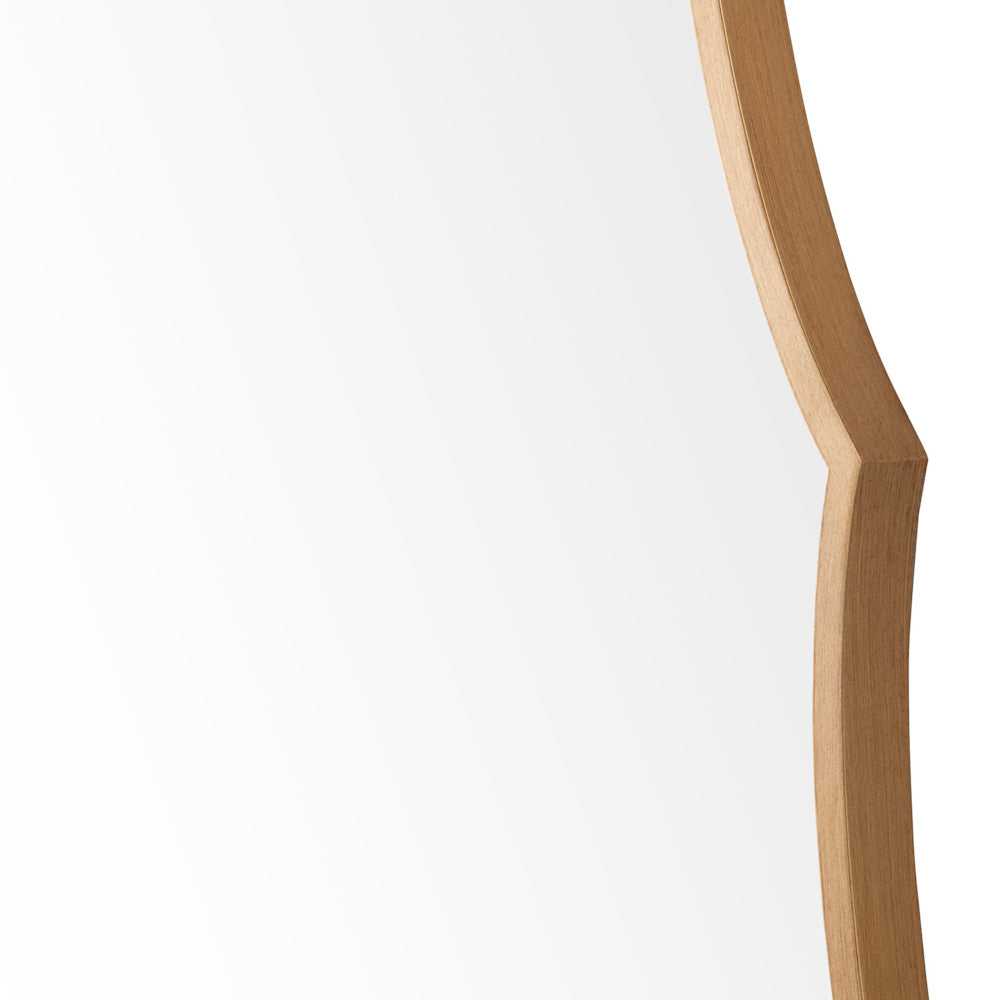Close-up of a gold scalloped mirror frame showing the ornate wood grain texture and elegant curved edge detail.