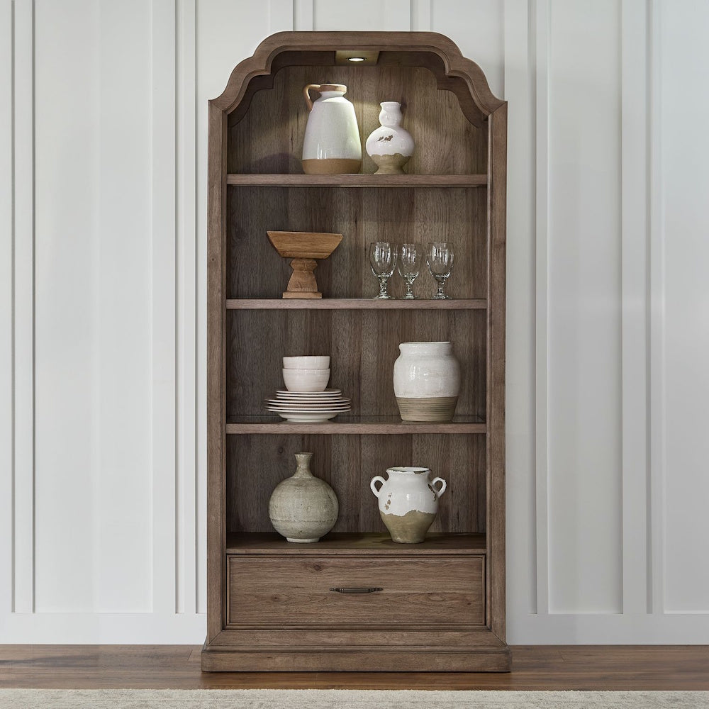 Hickory Grove arched wood display cabinet with built in lighting, shelves, and a bottom drawer.