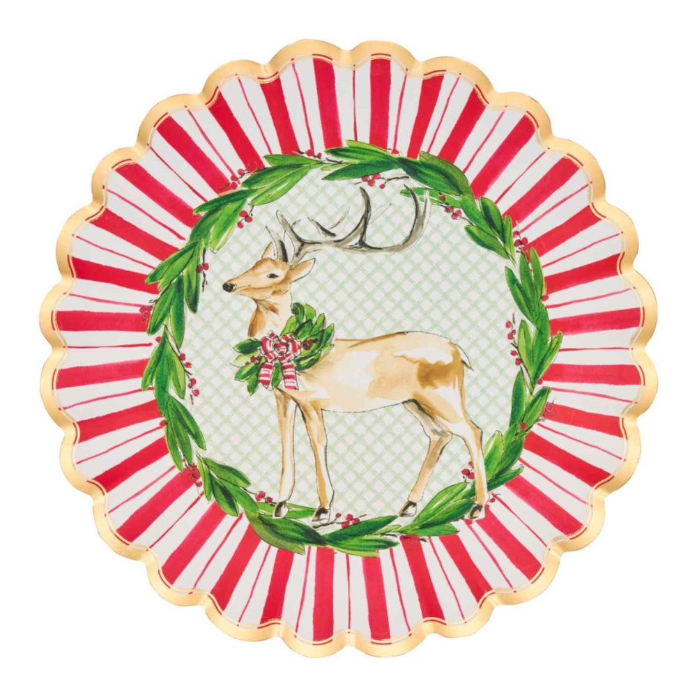 Flat lay view of a festive red, white, and gold paper dinner plate featuring a deer and holly wreath design.