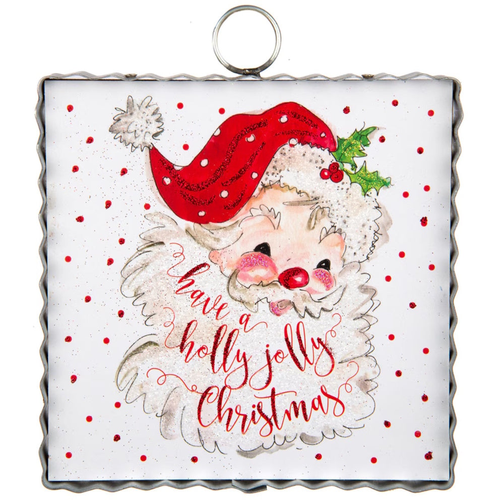 Front view of the red and white Santa art plaque featuring a painted metal design with holiday text.