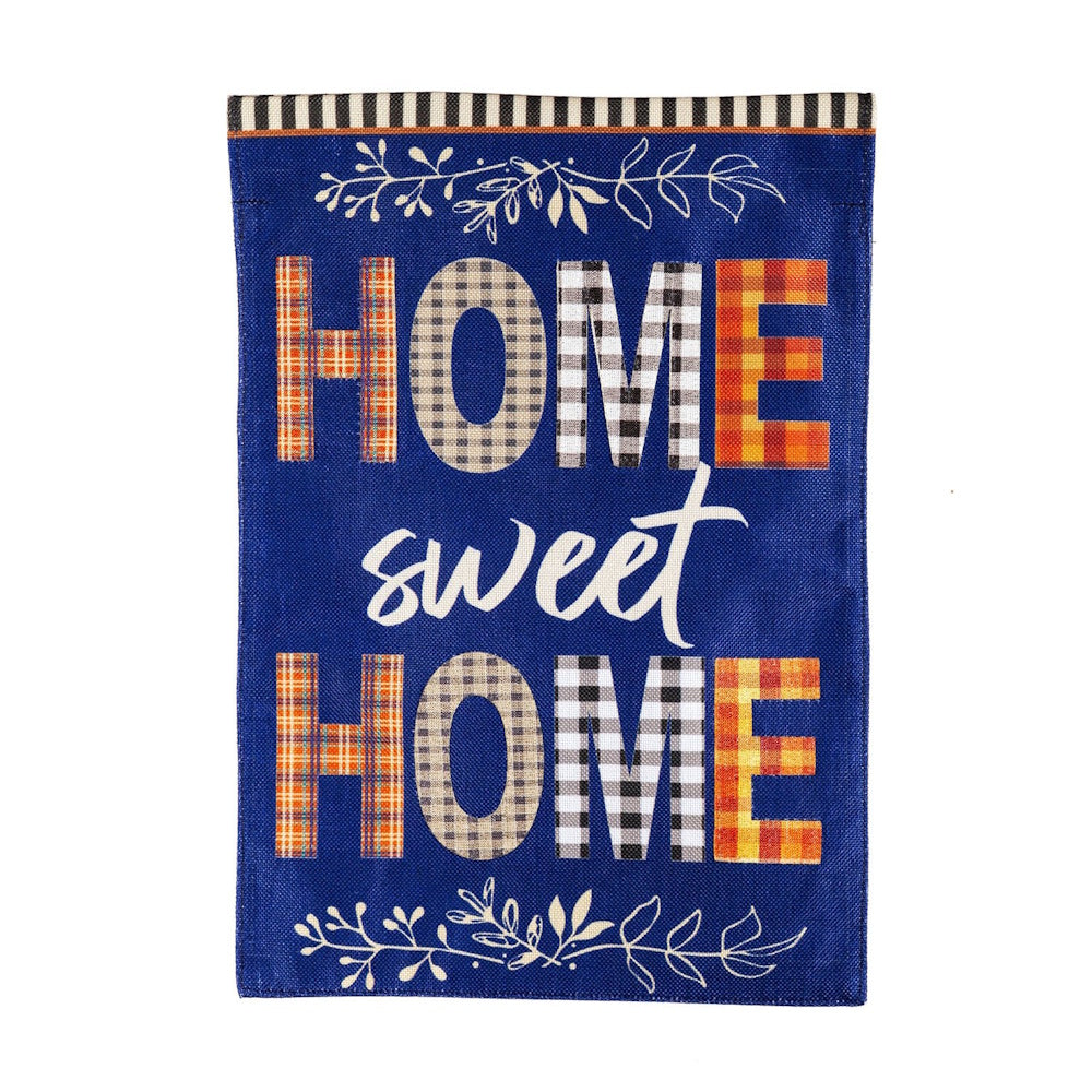 Blue burlap garden flag reading "HOME sweet HOME" with patterned plaid lettering and foliage.
