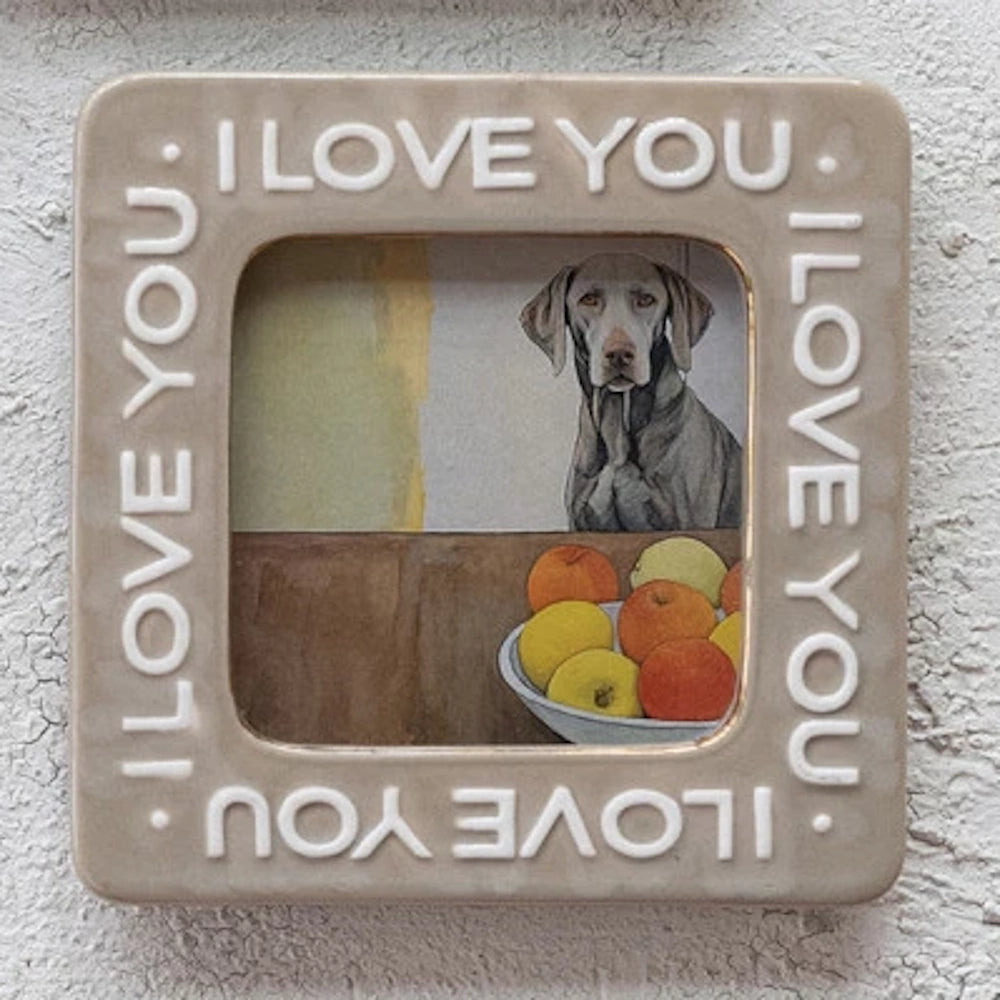 Square tan ceramic photo frame with embossed "I Love You" text, featuring a dog illustration and gold electroplated trim.