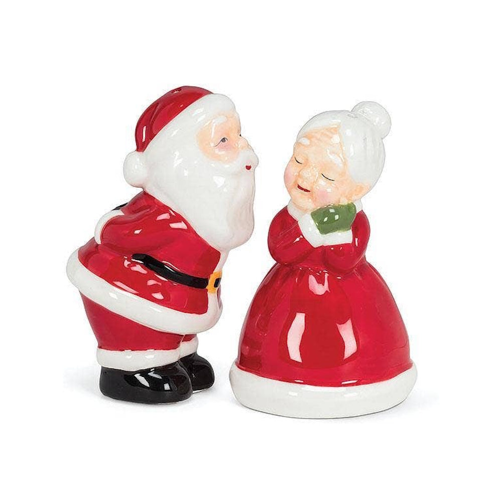 Ceramic Santa and Mrs. Claus kissing salt and pepper shakers in red holiday attire.