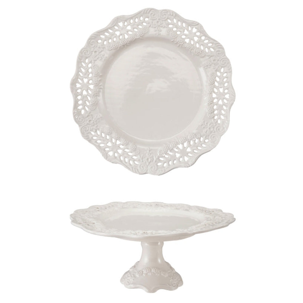 White stoneware pedestal with a scalloped edge and a pierced lace pattern.