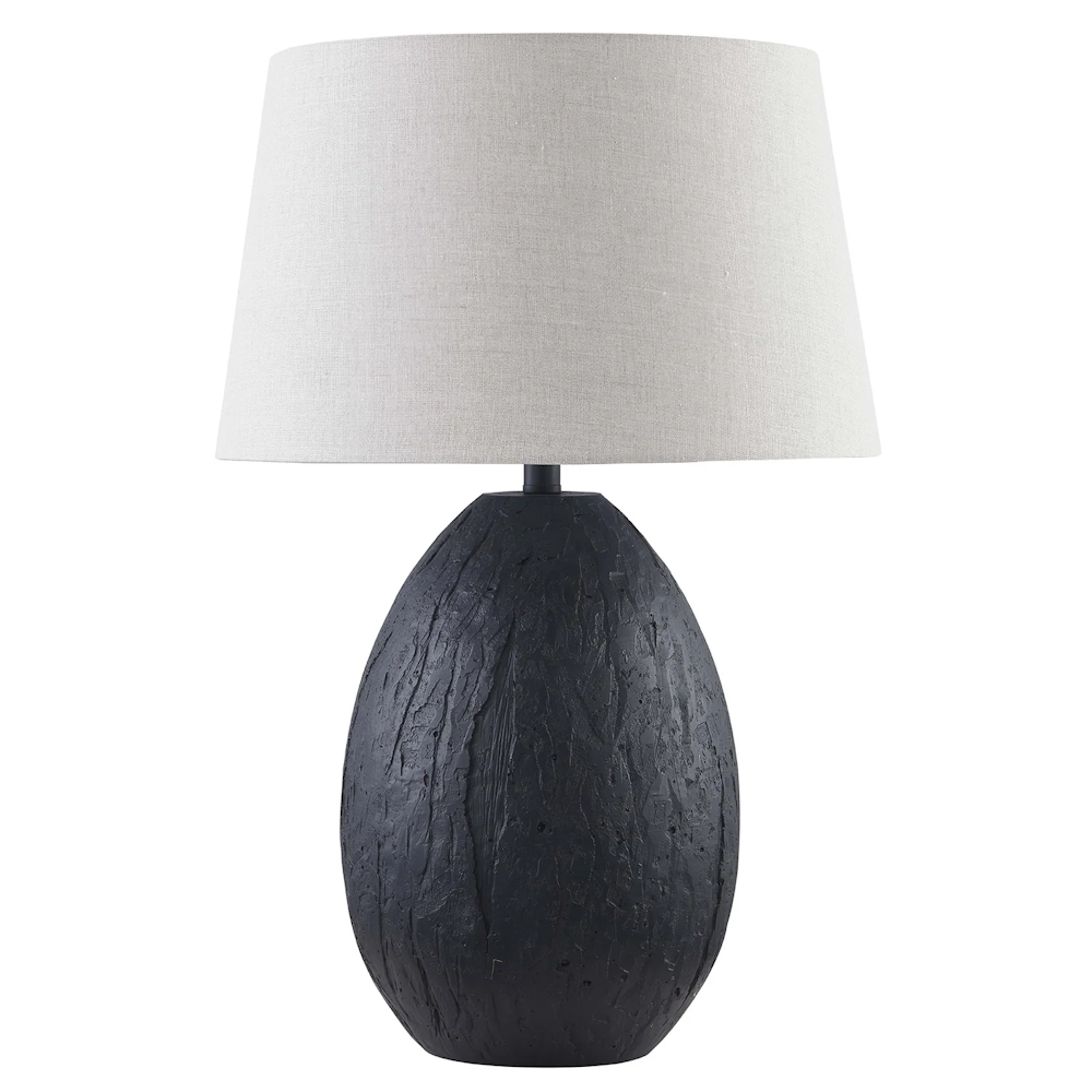 Black textured ceramic table lamp with light gray linen shade, modern accent lighting for living spaces.