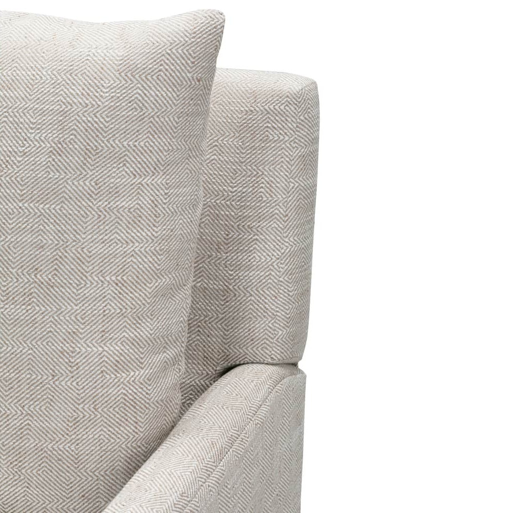 Close-up of a Lilah recliner featuring light beige textured fabric with a geometric diamond pattern.
