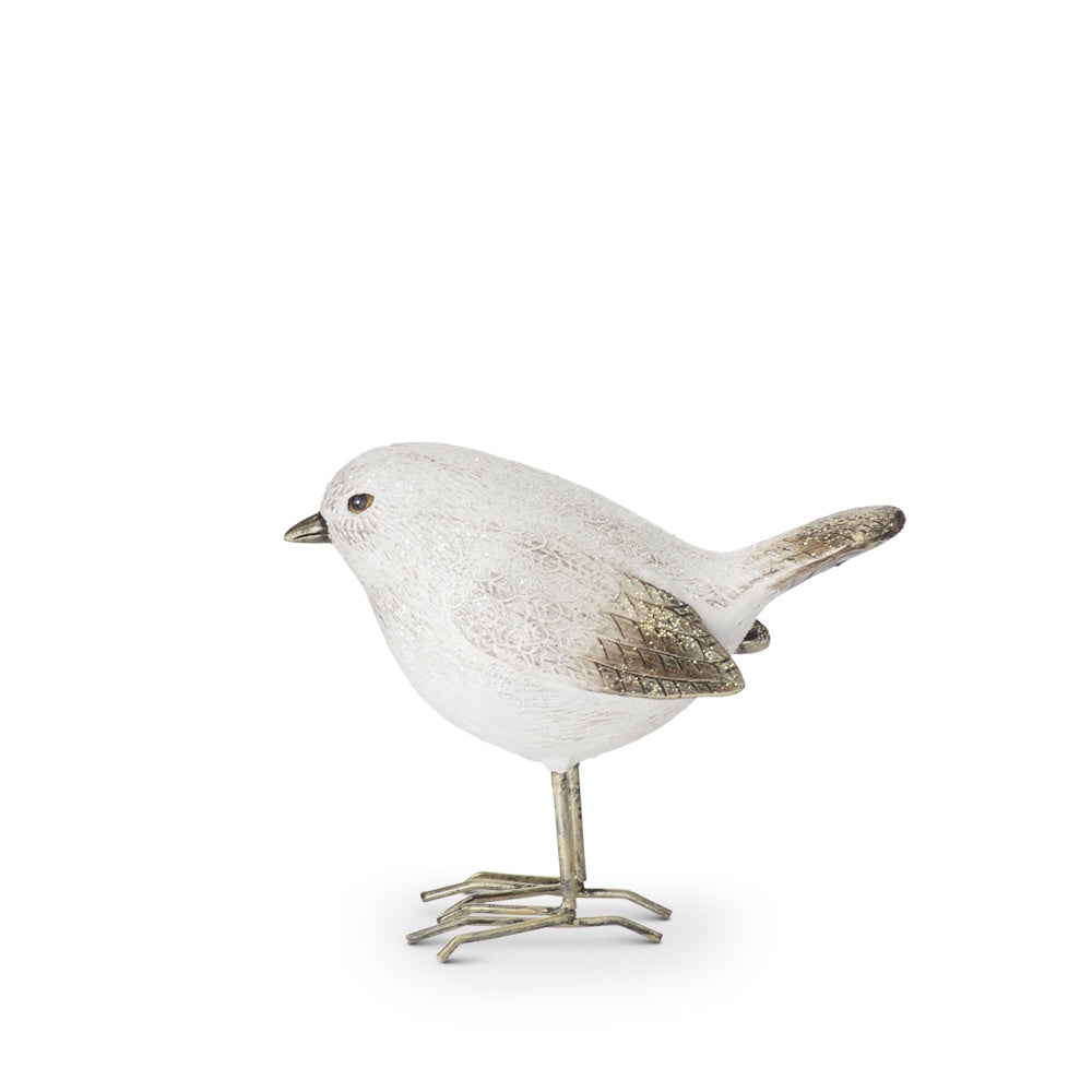 White and gold glittered bird figurine with textured details standing on thin metal legs against a white background.