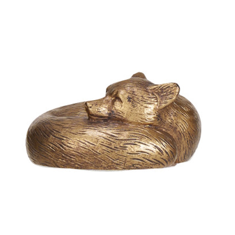 Bronze figurine of a curled-up, sleeping fox on a plain white background.