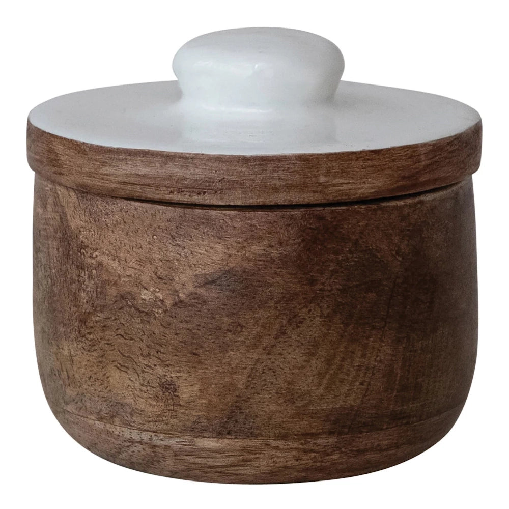 Small round wooden storage jar with a white ceramic lid and knob handle for kitchen or home decor.