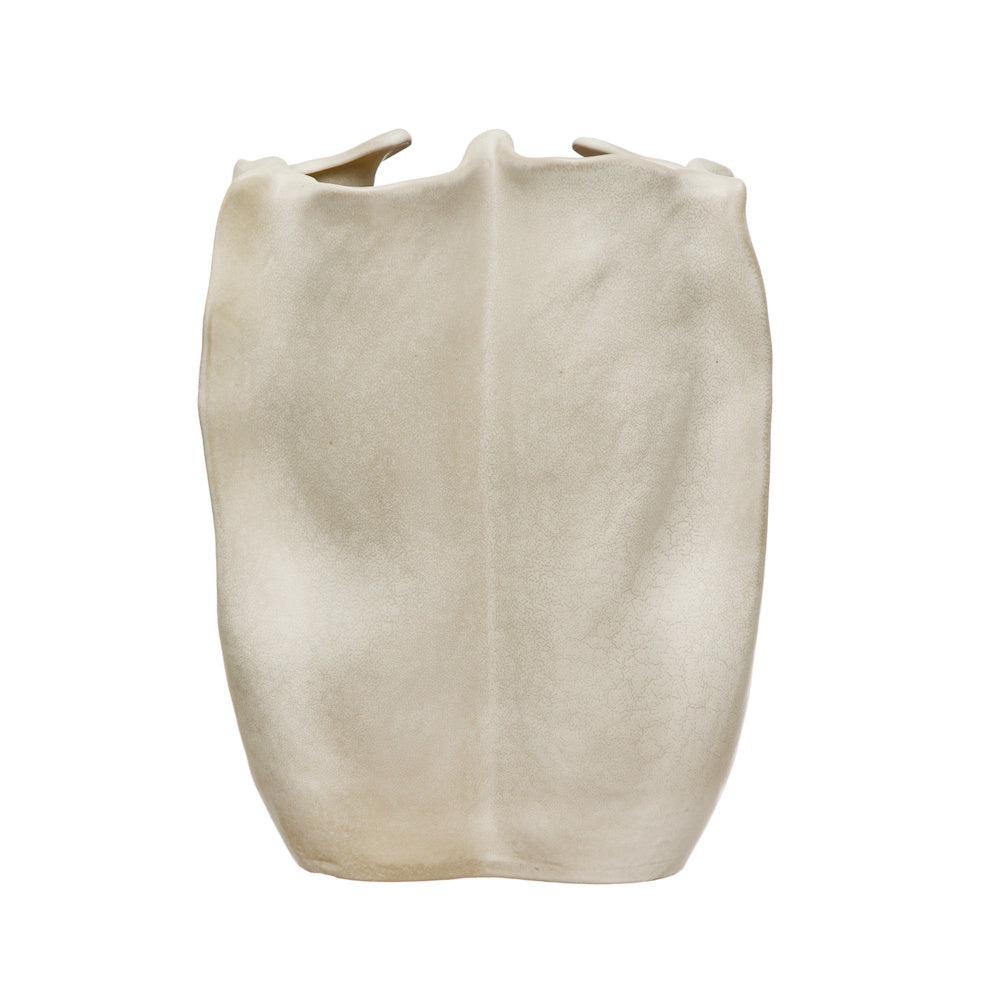 An organic-shaped, matte cream stoneware vase featuring a unique, wavy texture and structured silhouette.