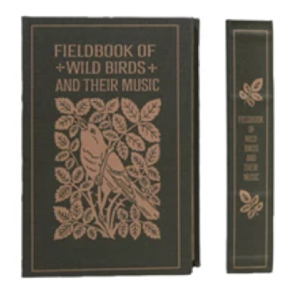 Vintage-style Fieldbook of Wild Birds and Their Music green cloth bound book with gold bird illustration.