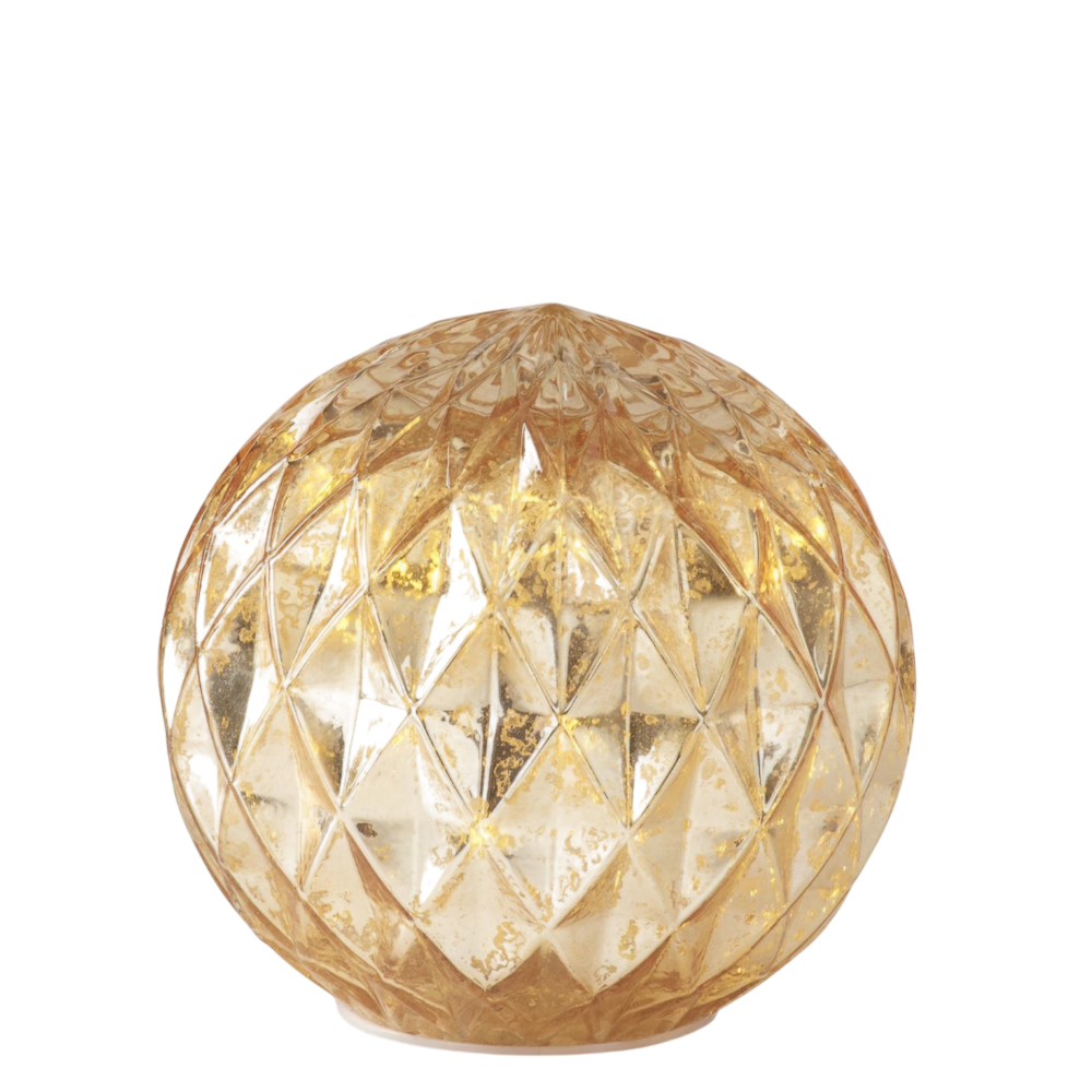 Medium glowing gold mercury glass globe with a diamond harlequin pattern on a white background.