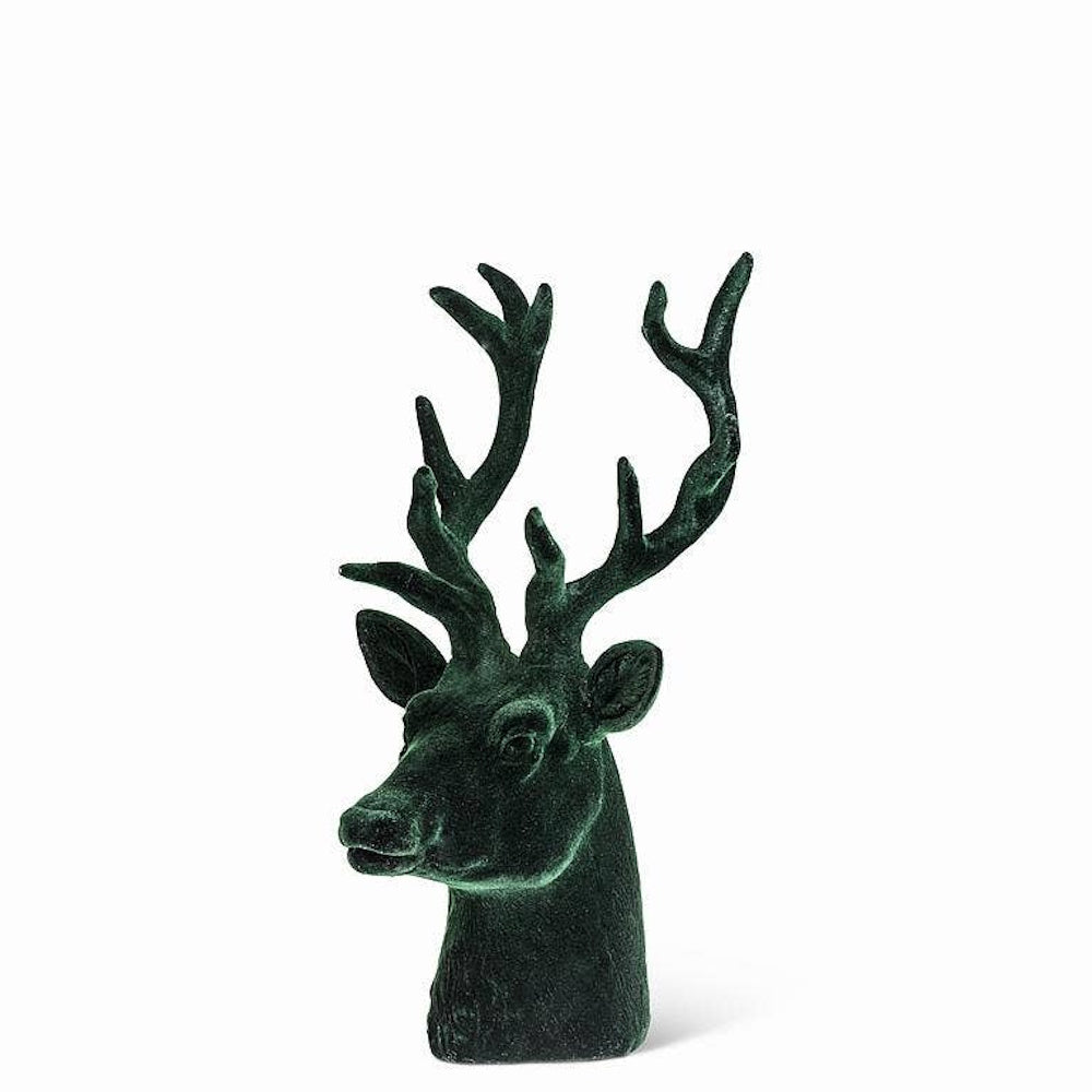 Velvet dark green stag head bust with prominent antlers, facing left against a white background.
