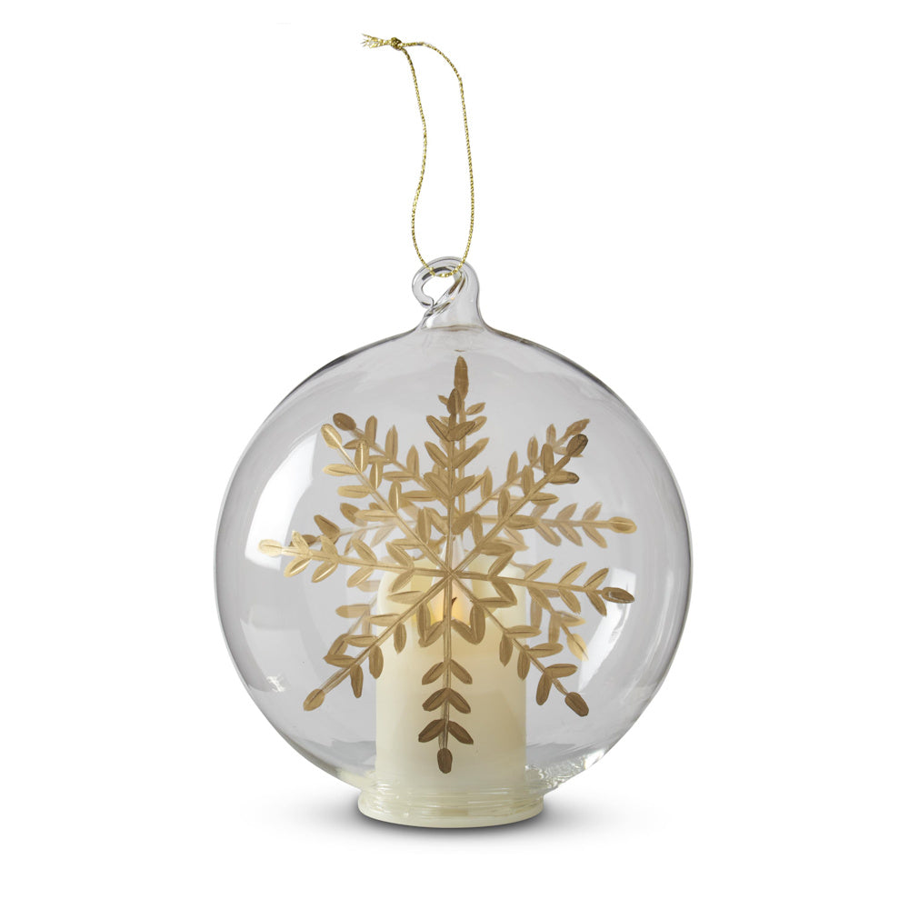 Medium LED clear glass spherical ornament with a gold-gilded etched snowflake design and internal candle.