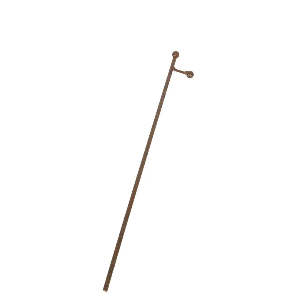 Front view of a medium rust metal charm display stake with a side arm.