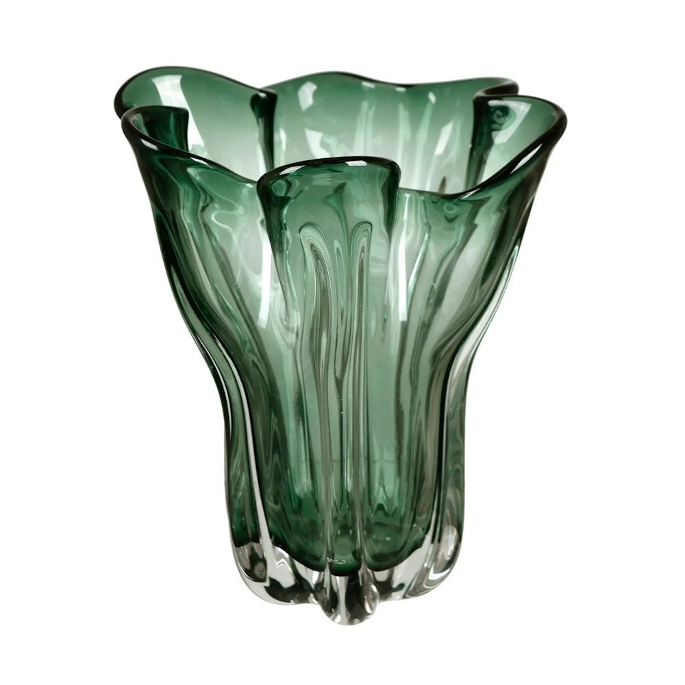 Emerald green wavy glass vase with a flared rim and organic, rippled texture on a white background.