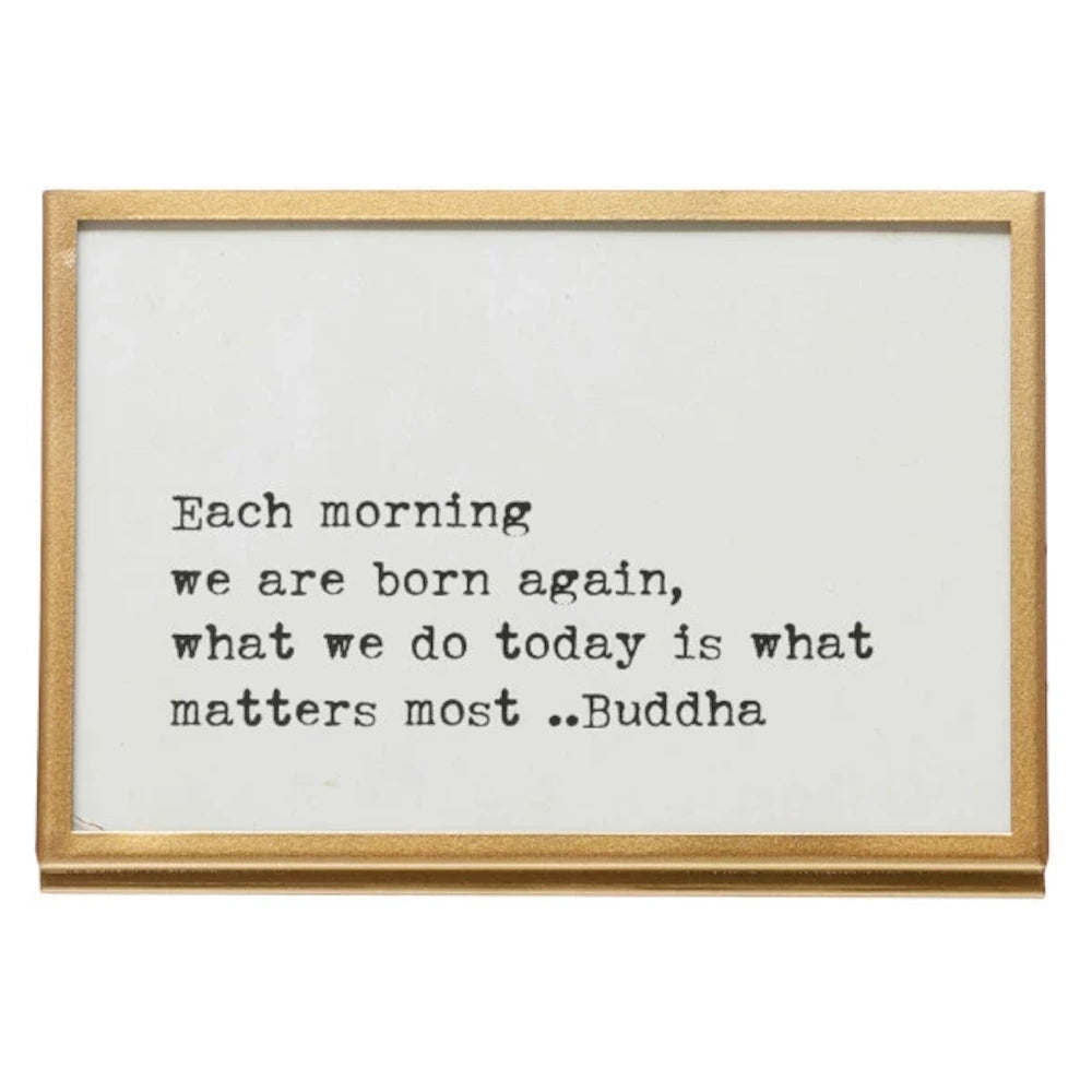 Gold metal and glass picture frame with a Buddha quote: "Each morning we are born again, what we do today is what matters most."