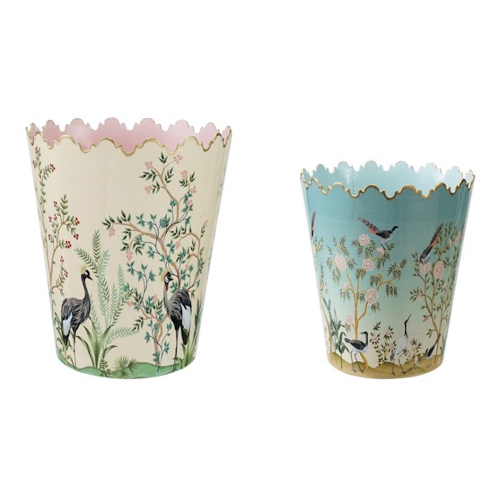 Two decorative scalloped buckets featuring nature scenes with birds, trees, and flowers on cream and blue backgrounds.