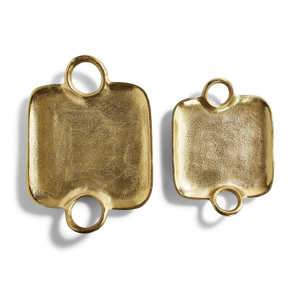 Set of two textured gold square decorative trays with circular ring handles side by side.